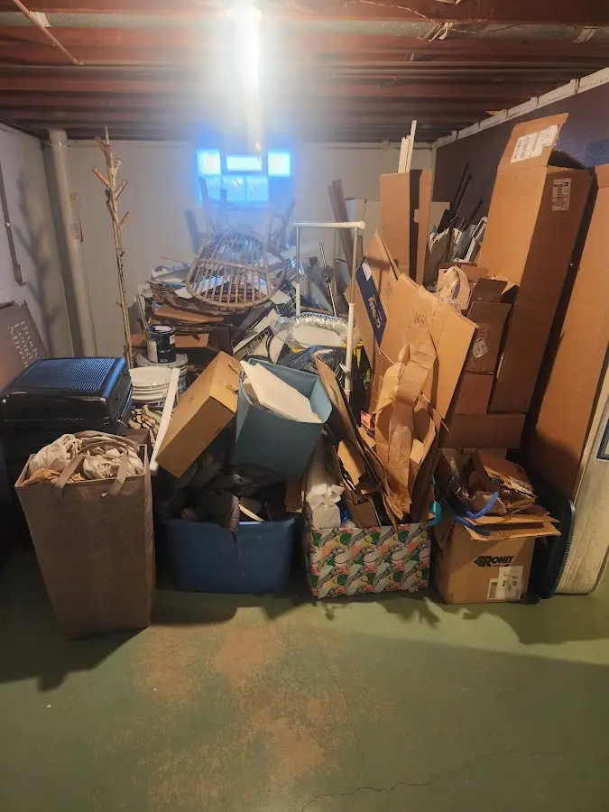 Roll-off dumpster container at job site for Yard Waste Dumpster Rental in Port Richey